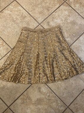 New with tags gold sequin skirt by CiCi size 2